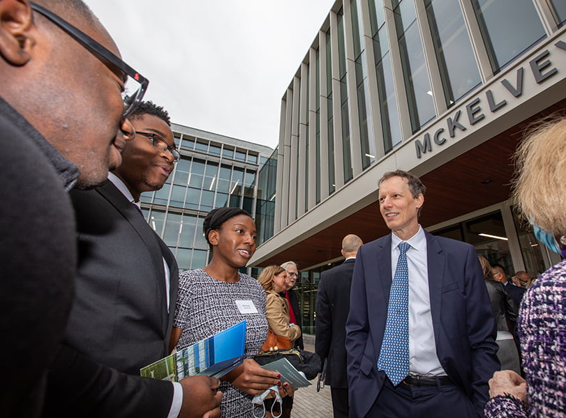 students talking with Jim McKelvey