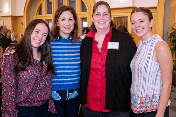 Abigail Jaeger, far left, and Cheryl Perlmutter, center left, have been involved with the Women & Engineering Center's mentorship program since 2021. They are pictured at the center's 2023 Leadership Summit with another mentoring pair, BettyLynn Ulrich and Toby Utterback. 