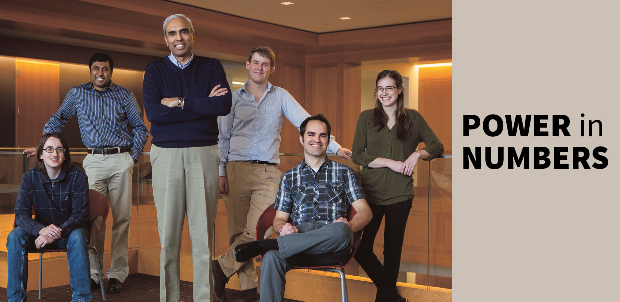 Rohit V. Pappu, PhD (center) with members of his lab. Photo by Ron Klein